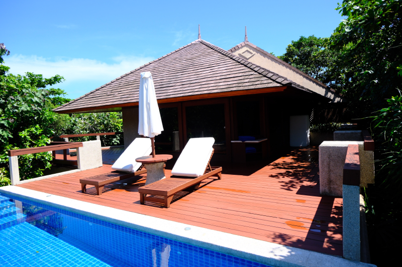 Accommodation / facilities - Pool, loungers and building.